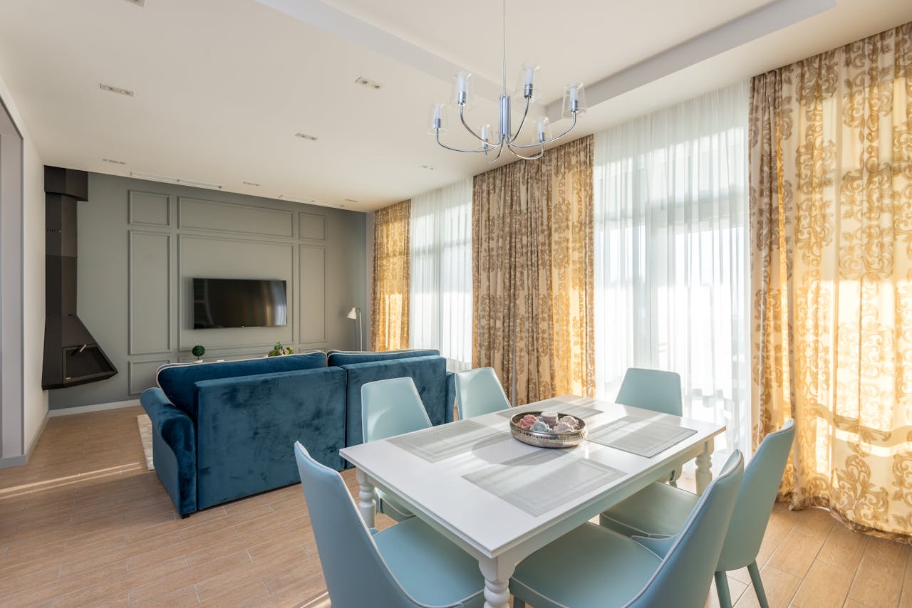 Bright contemporary living room with luxurious furnishings and elegant decor.